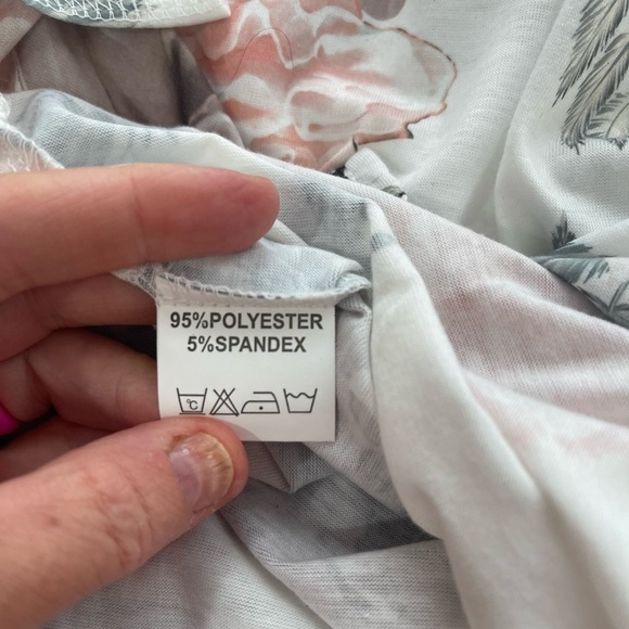 Boutique Floral V Neck Tee with Rolled Sleeves and a Longer Loose Fit - Picture 14 of 14